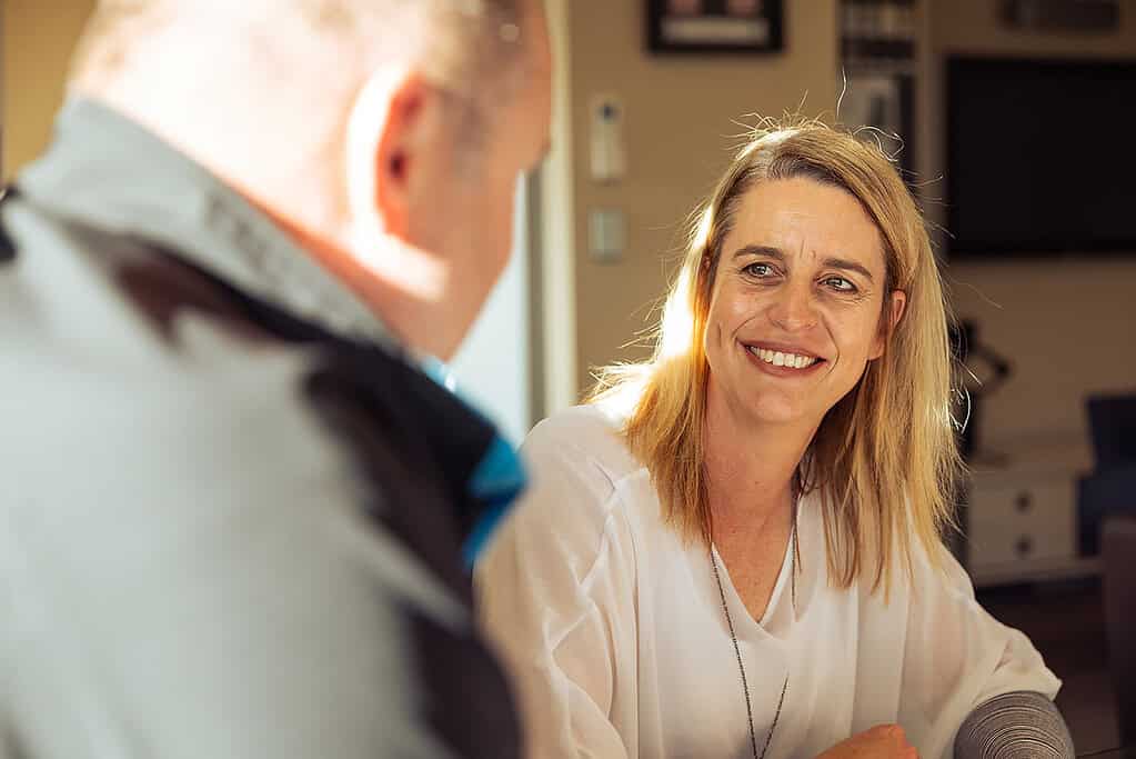 Coughlan Homes team member in conversation with a client