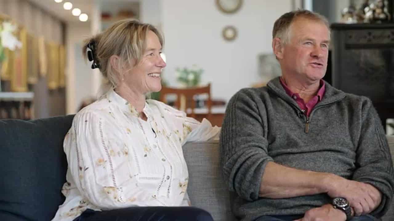 David and Fiona Bush in the living room of their Parnassus homestead rebuild