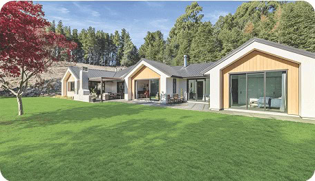 Award-winning Coughlan Homes build on a North Canterbury property, viewed across the lawn.